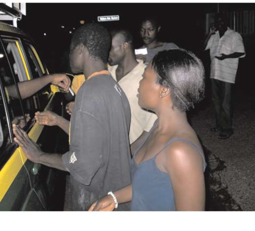 1. Our friends rush to the Information van to collect coupons for the Easter Soup Kitchen.